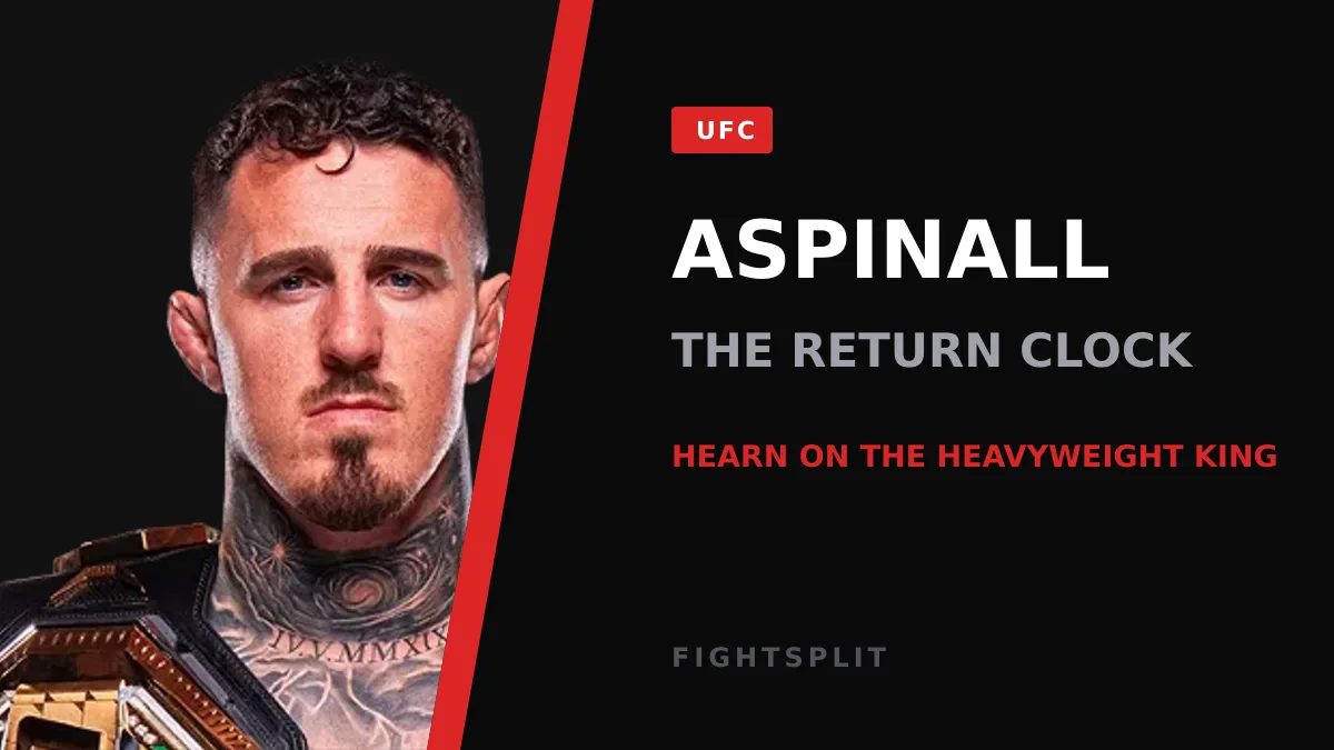 Tom Aspinall reacts after taking an eye poke during his UFC heavyweight title fight against Ciryl Gane at UFC 321 in Abu Dhabi